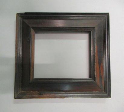null Rosewood frame veneered on a moulded pine core with an inverted sloping profile...