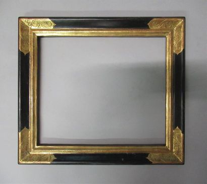 null Moulded, gilded and blackened wooden frame with stylised decoration of guilloches,...