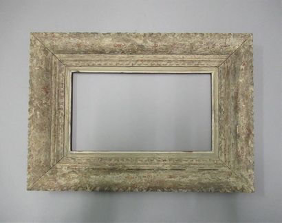 null Carved, painted and patinated wood frame from "Montparnasse" with stylized decoration...