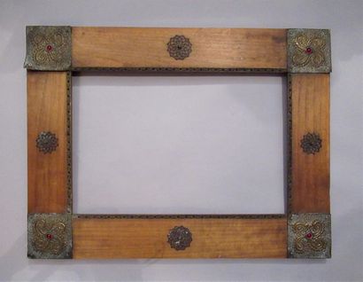 null Frame in natural pitchpin with flat profile veneered with Moorish style metal...