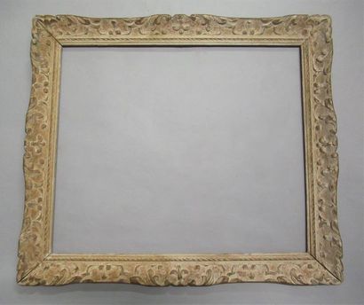 null Carved, painted and patinated wooden frame called "Montparnasse" with stylized...