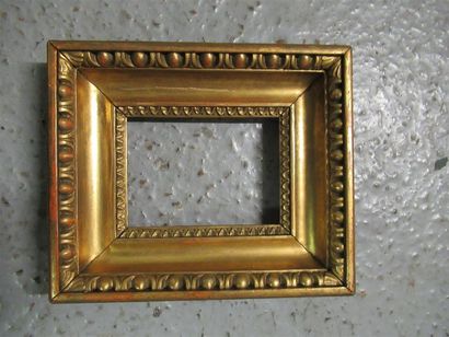 null Carved, gilded wooden frame with a gilt throat profile and a frieze of eggs...
