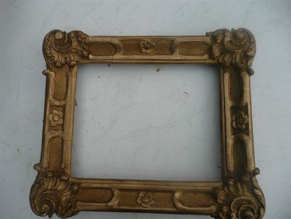 null Gilded carved wood frame with shells, sandblasted and rosettes decoration.
Provence,...