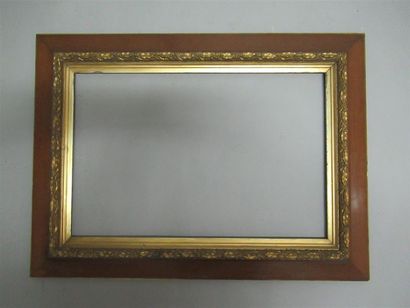 null Pine frame painted faux wood and gilded stucco decorated with laurel leaf tortoiseshells.
End...