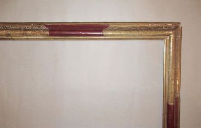 null Very large moulded wooden frame, gilded and painted red with an inverted profile...
