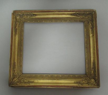null Wooden frame and gilded paste with a soft profile and sandblasted plate, frieze...