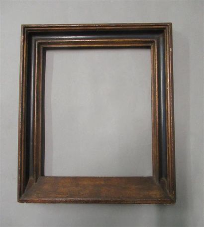 null Frame in moulded gilded wood painted black and patinated called "à édicule"...