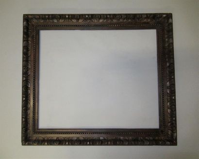 null Natural wood frame stained, waxed and decorated with beaded stripes and friezes...