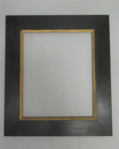 null Blackened wooden frame and gilded view with wide flat and sloping profile.
Late...