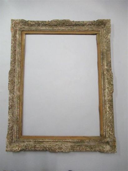 null Large carved, painted and patinated wood frame called "Montparnasse" with a...