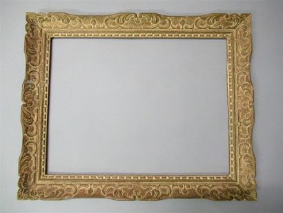 null Carved, painted and patinated wood frame called "Montparnasse" with stylized...