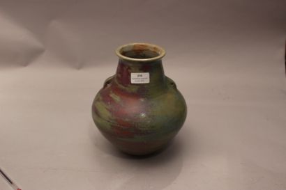 null Travail des années 70

Vase gourde en grès émaillé vert à deux petites anses

Monogramme

H...