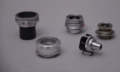 null Appareil photographique, Trois objectifs et deux accessoires Leitz Leica. Objectif...