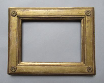 null Molded oak frame, gilded with a flat profile framed by two burnished staves...