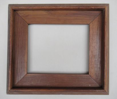 null Moulded oak frame made of two parts, one with an inverted slope profile and...