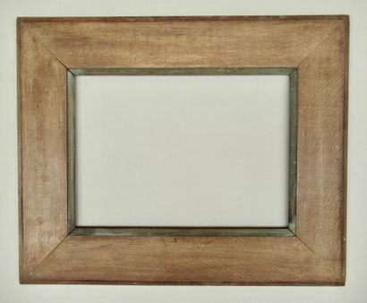 null Natural and bronzed moulded oak frame with a large flat profile framed by two...