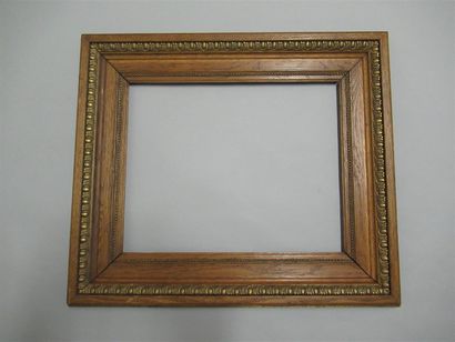 null Natural oak frame, moulded and bronzinz paste decorated with pearl grapes and...