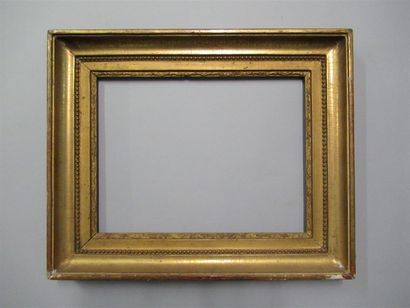 null Oak and gilded paste frame with pearls and friezes decoration.

Late 18th century...