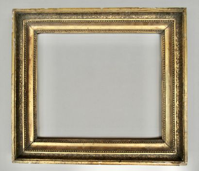 null Wooden frame and bronze paste decorated with pearl stripes and friezes of palmettes...