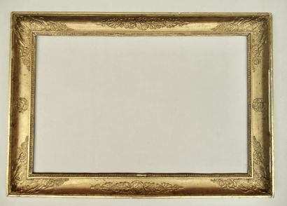 null Wooden frame and gilded paste called "à gorge" decorated with rais de coeur,...