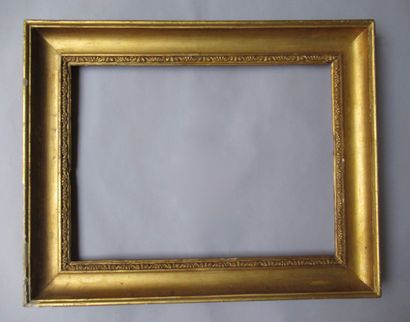 null Wooden frame and gilded paste called "à gorge" with stylized friezes of acanthus...