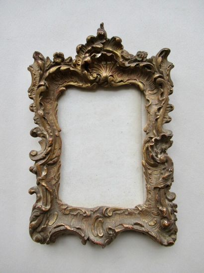 null Wood and gilded stucco photo frame with shells and rocaille flowers

Louis XV...