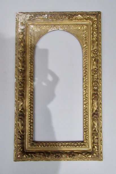 null Carved oak frame, gilded with friezes of acanthus leaves, laurels, flowers and...