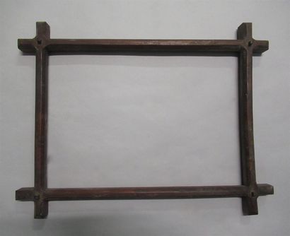 null Carved natural wood frame with unhooked corners and corners held by a peg

19th...