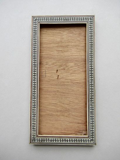 null Wooden frame with flat profile veneered with camel bone marquetry and exotic...