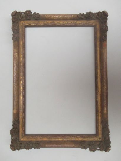 null Wooden frame and gilded stucco with copper called "flowered corners" decorated...