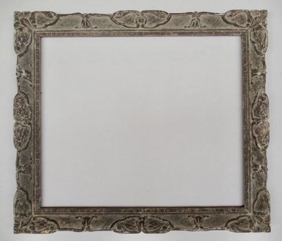 null Carved, painted and patinated wood frame with stylized friezes of dentils, plamettes,...