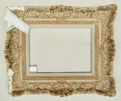 null Wooden frame with gilded, painted and patinated stucco called "Montparnasse"...