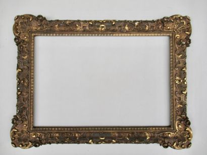 null Wooden frame and gilded stucco decorated with palmettes, flowers, crosses and...