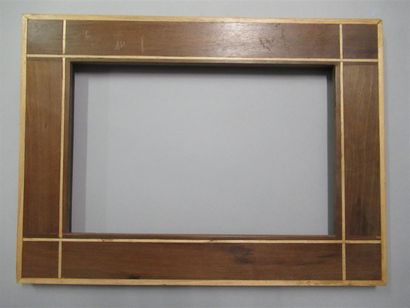 null Mahogany and light wood frame veneered on a pine core with flat profile, decorated...