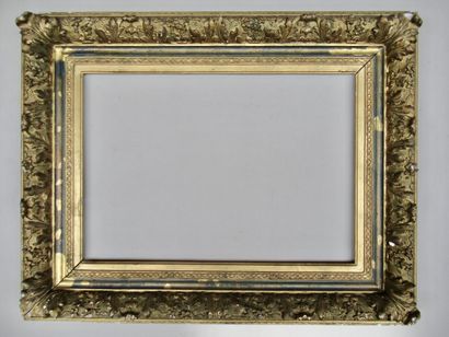 null Wood and gilded stucco frame decorated with friezes, acanthus leaves and flowers

Louis...