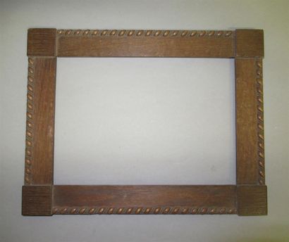 null Varnished natural oak frame with flat profile, decorated with squares in the...