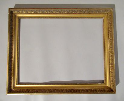 null Wooden frame and gilded paste called "double groove" decorated with rais de...