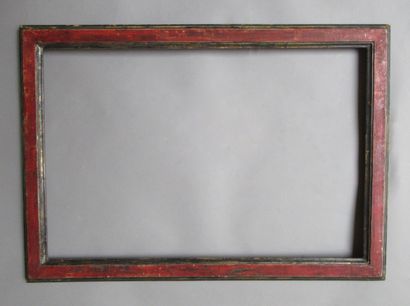 null Silvered and painted red walnut rod with double doucine profile framing a dish.

Italy,...