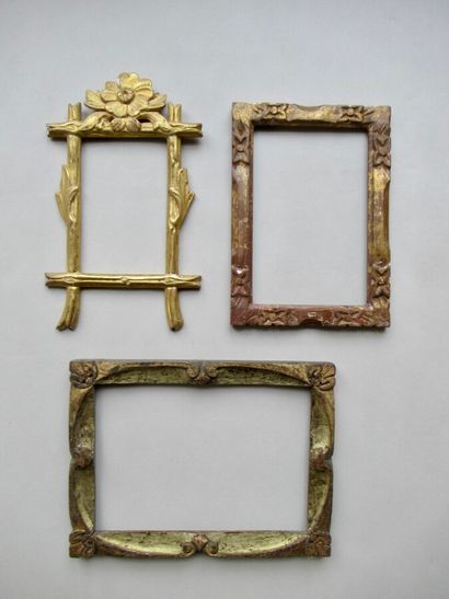 null Set of three carved and gilded wood frames with various stylized floral decorations

20th...