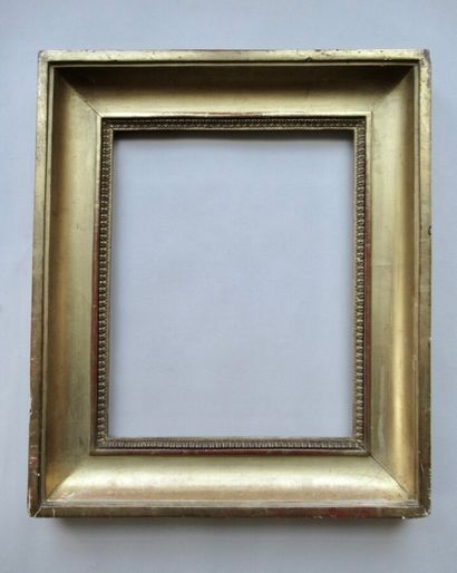 null Wood and gilded paste frame with heart-shaped grapes decoration

Late 18th century

20...