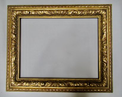 null Wood and gilded stucco frame with stylized decorations of acanthus leaves, friezes...
