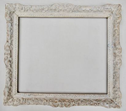 null Painted and patinated carved pine frame called "Montparnasse" with stylized...