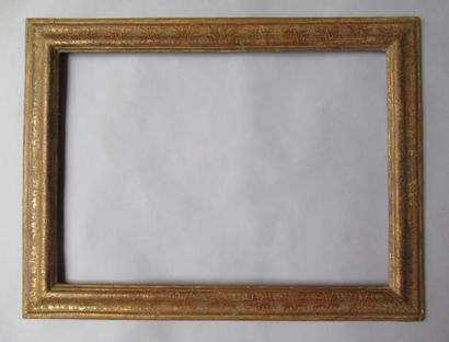null Moulded and gilded wood frame with inverted profile decorated with acanthus...