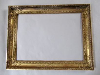 null Wooden frame and gilded paste called "à gorge" decorated with rais de coeur,...