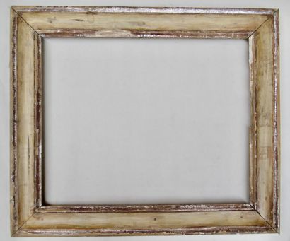 null Wooden frame gilded with silver and painted off-white with a large flat profile

Italy,...