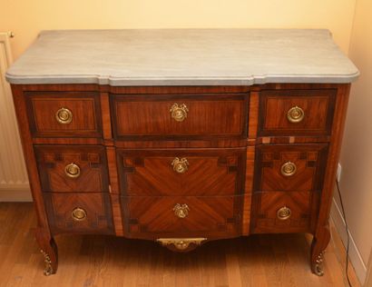 null Veneer chest of drawers with a slight central projection opening with five drawers,...