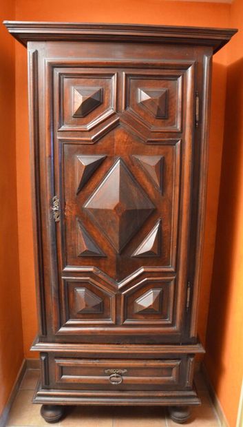 null Natural wood cabinet called "diamond point", opening with a door and a drawer,...