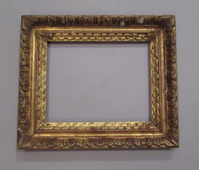 null Carved wood frame, gilded with stylized decoration of heart-shaped grapes and...