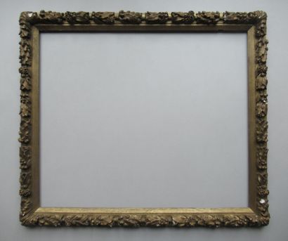 null Oak and stucco frame with alternating oak, laurel and flower decorations

Louis...