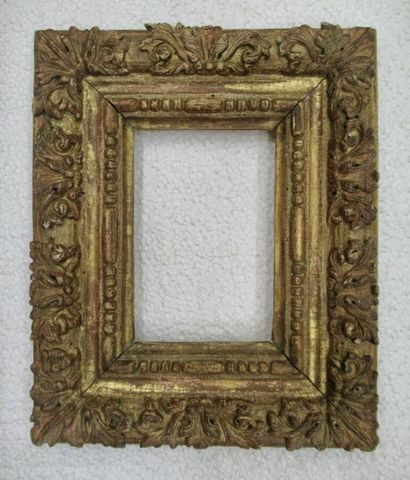 null Old gilded limewood frame decorated with friezes of acanthus leaves, guilloche...